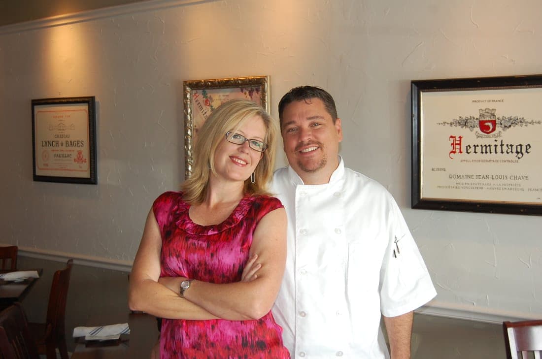 Chef Ron Brandani in chef whites and Claire Brandani at Brandani's Restaurant